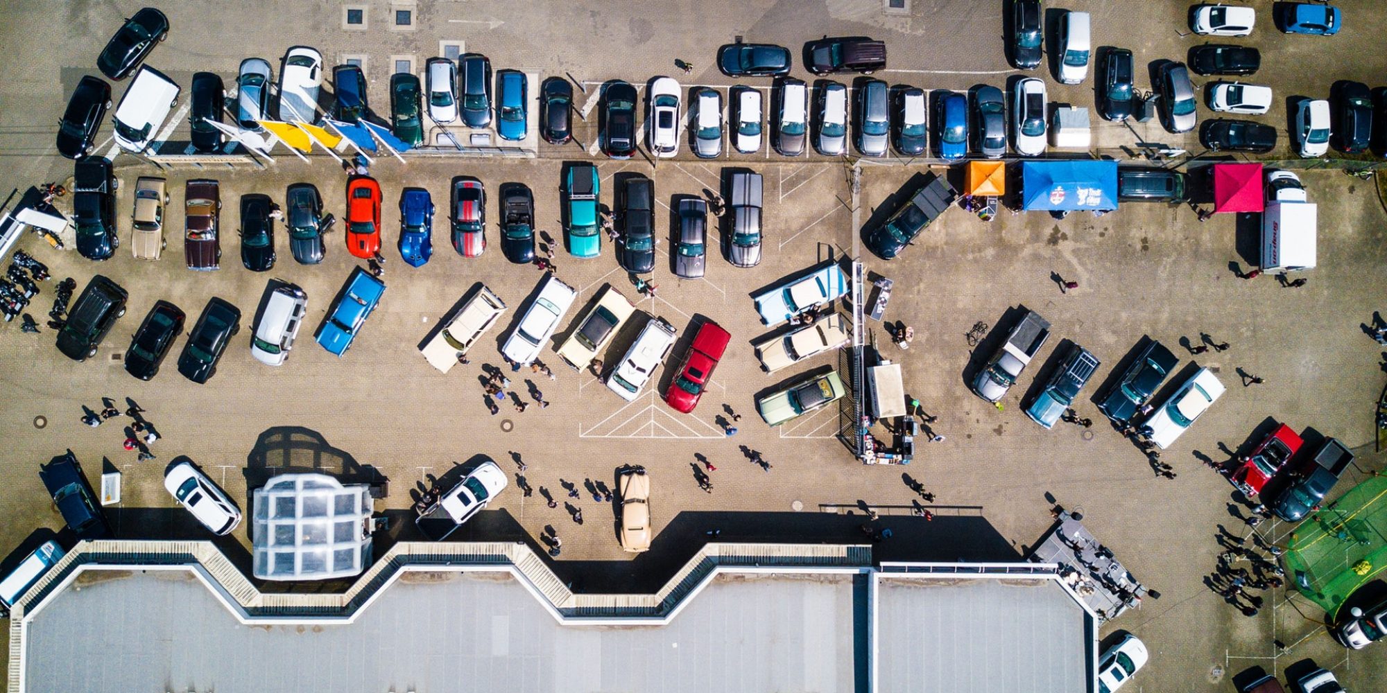 photo-from-above-of-vehicles-parked-near-building-753876 (1)